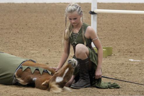 Wyndi Veigel-Gaudette | Citizen staff photo Carley Cary, the first child in the Morning Star program, shows liberty training skills with her horse Kiwi. Liberty training establishes a bond between horse and trainer with no bridles or halters used.
