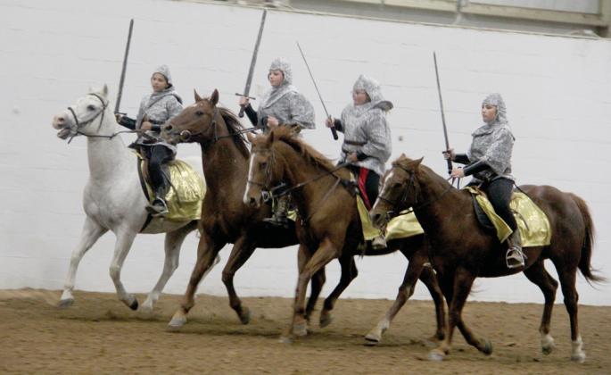 Ella Smith, Bella Connor, Makynlee Turner and Raegan Fondecaro showcase their riding skills as warriors during the 4th annual Morning Star Gala benefitting the faith-based riding center, Morning Star Ranch. For more photos of the event see The Dublin Citizen Facebook page. Wyndi Veigel-Gaudette | Citizen staff photo