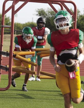 The 2026 Dublin Lions donned their full pads as they practiced in the green and gold Saturday, Aug. 8 on Cervetto Field. The athletes practiced plays, blocking, passing, tackling and more under the guidance of coaches on the field. The Lions head to Breckenridge Friday, Aug. 14 for a scrimmage and return home for a scrimmage against Hico Thursday, Aug. 20. Paul Gaudette | Citizen staff photos