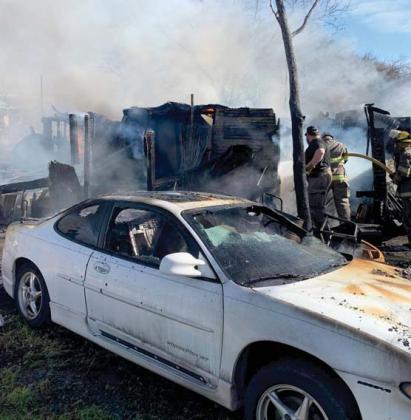 Dublin VFD responded to a shop fire in the 400 block of West Sheridan on Saturday, Jan. 14. The department arrived to the shop being totally involved, two vehicles on fire, one of which had a ruptured gas tank and flames approaching the home. The crew immediately addressed the fire closest to the home, then applied foam on the gasoline fire so they were able to keep the fire away from the home. Dublin EMS was on scene to make sure everyone was safe. Courtesy photo