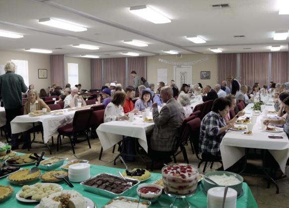 Anniversary celebration goers enjoy a lunch at Greens Creek Baptist Church. Wyndi Veigel-Gaudette | Citizen staff photo
