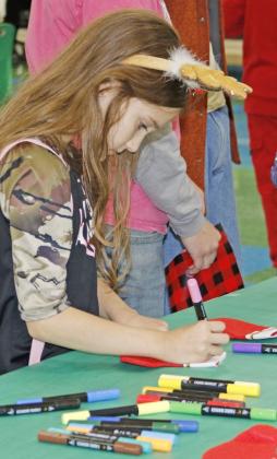 Dublin Elementary PTO held another successful Jingle Bell Bash Tuesday, Dec. 9 in the Dublin Intermediate cafeteria. Kids and parents flocked to the games, photo booths, crafts and refreshment stations and even got a chance to check out vendors and meet up with Santa. Wyndi Veigel-Gaudette | Citizen staff photos