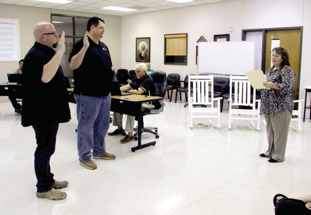 Dublin ISD School Board Members Ryan Mitchell and Cole Leatherwood are sworn into office Monday, May 11 by DISD Superintendent Assistant Glenna Ricks. It will be Mitchell’s second term in office and Leatherwood’s first term. Wyndi Veigel-Gaudette | Citizen staff photo