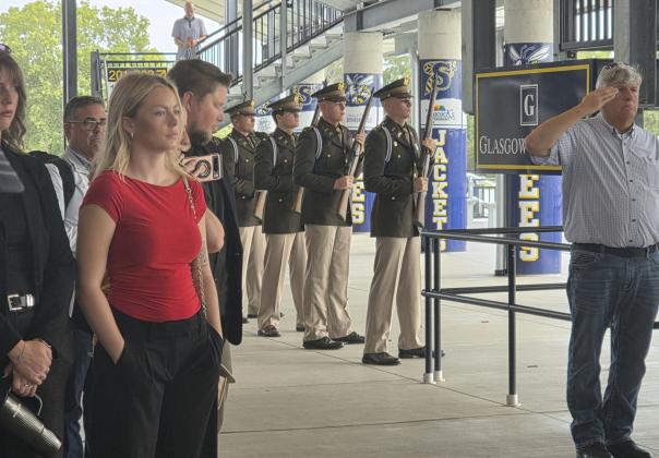 Tarleton Corps of Cadets provides a 21 gun salute at the annual Stephenville 9/11 ceremony. Below, participants stand in honor of the National Anthem sung by the Stephenville High School Choir. For more photos see the Dublin Citizen Facebook page. Wyndi Veigel-Gaudette | Citizen staff photo