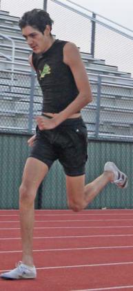 Wyndi Veigel-Gaudette | Citizen staff photos Jayden DeLeon (above), Jitse Boer and JV Lady Lion Relay teams compete at the Dublin Invitational Track Meet.