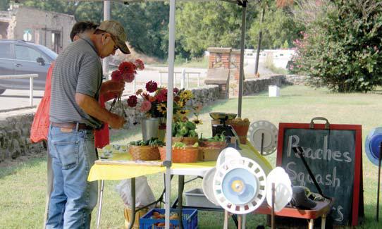 A wide variety of fresh produce and flowers were available at the July 20 Market Days located in Wright Park downtown. The market is offered the third Saturday of each month. Below, handmade wooden boxes are for sale. Paul Gaudette | Citizen staff photo