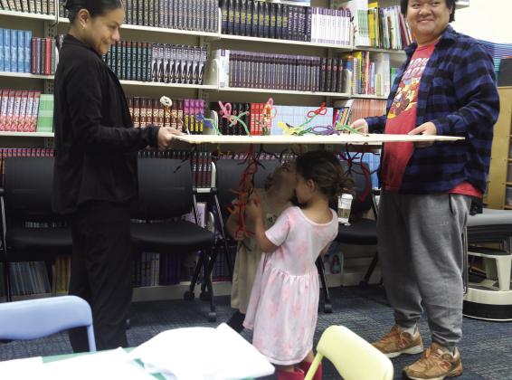 Kids learn the process of growing flowers and food in a demonstration at the Dublin Public Library Thursday, April 2 thanks to a Mommy &amp;amp; Me class provided by Texas AgriLife. Paul Gaudette | Citizen staff photo