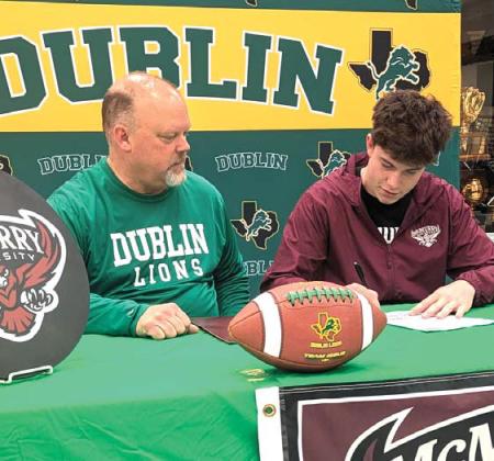 Dublin High School celebrated a double signing Friday, Feb. 21 as Lion football players Jake Southall and DJ Ferguson (above and right with families) signed to join the McMurry Warhawks on the turf in Abilene. Paul Gaudette | Citizen staff photo