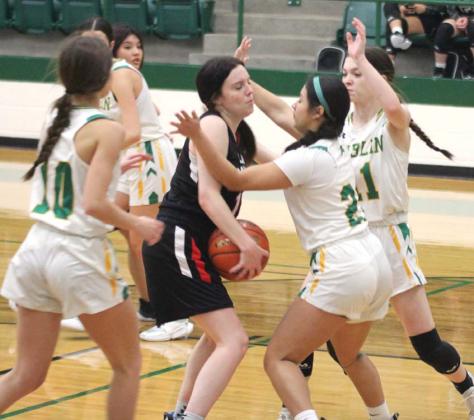 Dublin JV Lady Lions converged on a Three Way Lady Brave during their Nov. 21 home game. The Lady Lions were narrowly edged out by the visiting team, 24-23. Paul Gaudette | Citizen staff photo