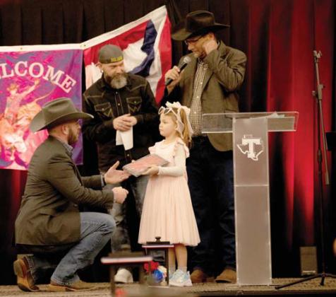 The Monk Strong Memorial Foundation received the Mason Brooks Humanitarian Award presented by Mike Pruitt with the Rylan Strong Network and Maddi Brooks. Danielle Meador | Citizen staff photo