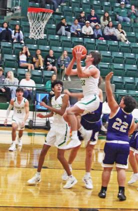 Dublin Lion Hunter Jones springs up around San Saba defenders to score 2 points in the Nov. 25 home game which resulted in a win for the Lions. Paul Gaudette | Citizen staff photo