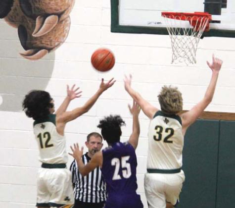Dublin JV Lions leap up to rebound a ball over a San Saba Armadillo in the Nov. 25 home game. Dublin took the win 54-23. Coach Hayden Hoerdemann praised the boys for their aggressiveness and pushing a lot of turnovers. He also said they are getting to rotate players and keeping everyone fresh. Paul Gaudette | Citizen staff photo