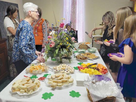 President Fran Jurney and other members of the Women’s Thursday Club of Dublin help young ladies get food and drinks at a reception hosted by the club in conjunction with the interviews at First Methodist Church Sunday, March 5. Wyndi Veigel | Citizen staff photo