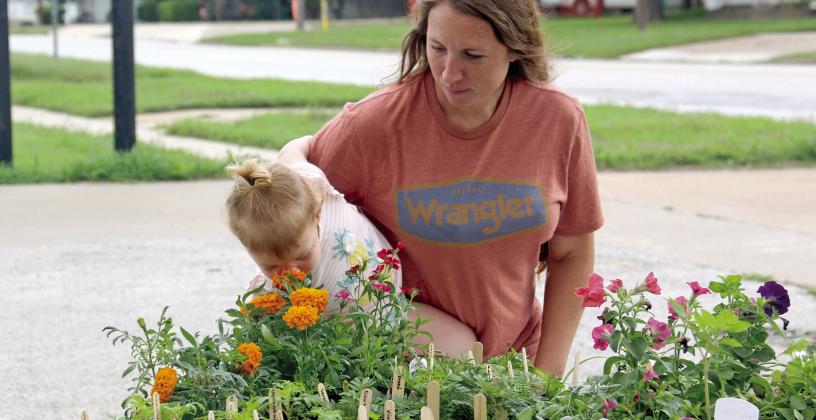 The Dublin Garden Club recently had a plant sale where its members sold plants from their own stock in order to raise funds for their annual high school scholarship. Even the youngest plant enthusiasts took time to stop and smell the flowers. Wyndi Veigel-Gaudette | Citizen staff photo