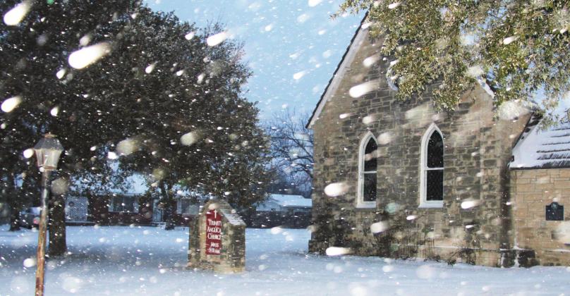 Snow drifts in front of the historic Trinity Anglican Church Sunday night. The local area including Highway 377 (below) and the former Patrick Street Inn (bottom) were coated with the snowfall which remained for day due to the sub-freezing temperatures (See Weather Watchin’ on page A4. for Dublin’s highs and lows of the last week.) Paul Gaudette | Citizen staff photo
