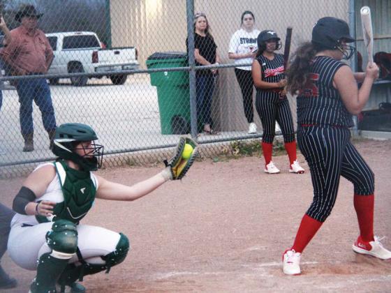 Dublin Lady Lion catcher snags a strike thrown past a Strawn batter by pitcher Jaylee Black during a Feb. 27 win at home. Paul Gaudette | Citizen staff photo