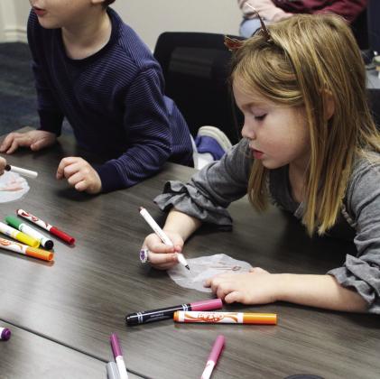 Middle Trinity Groundwater Conservation District and Dublin Public Library offered a STEM Day as MTGCD education/public relations director Mia Schlicke led kids through activities like coloring wax cutouts of birds for stained glass-like window hangings. The next STEM Day at the library will be Dec. 18 at 10 a.m. Paul Gaudette | Citizen staff photos