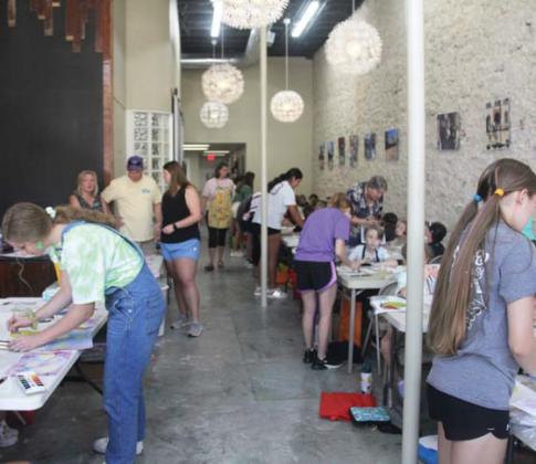 58 kids crowd into the Cross Timbers Fine Arts Council space downtown for their annual Art Camp. Wyndi Veigel-Gaudette | Citizen staff photo