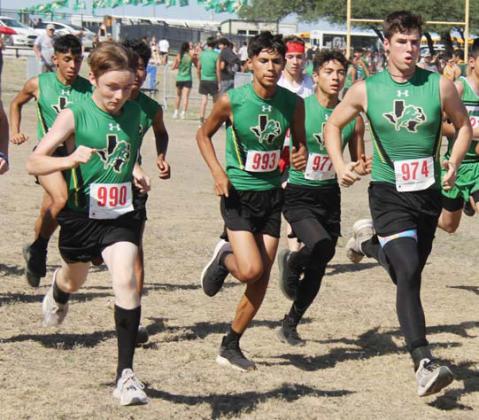 Paul Gaudette | Citizen staff photo Dublin Cross Country Varsity Boys rip through the starting line at the Dublin Dash on Wednesday, Sept. 27.