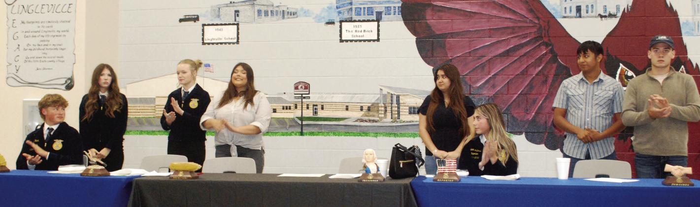 Lingleville FFA officers for the 2026-27 school year stand ready to take the torch from 2025-26 officers at the end of the annual Lingleville FFA banquet Thursday, April 30 in the school cafeteria. More photos of the event will be shared on the Dublin Citizen Facebook page. Paul Gaudette | Citizen staff photo