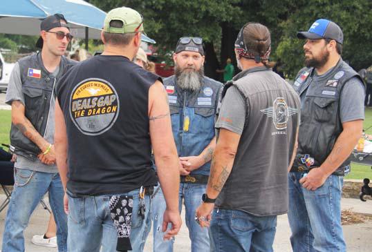 Servant Souls hosted a poker run bike event Saturday morning in conjunction with Day of the Cowboy, drawing 15 riders. The winner, Mercedes Scott, drew five aces to claim bragging rights. Paul Gaudette | Citizen staff photo