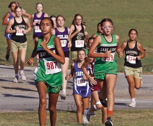 Dublin 8th grader Amilliana Torres leads the pack to a gold at the Wednesday, Oct. 8 district meet at Dublin Secondary followed in the above picture by Remi Chapman (who placed third). Chloe Goodrick (below, left) placed fifth in the event. Below, Dublin JH 7th and 8th grade boys race to 3rd place finishes as teams. Wyndi Veigel-Gaudette | Citizen staff photos