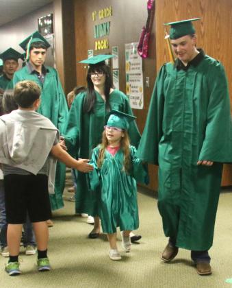 Dublin seniors walked hand-in-hand with kindergartners Tuesday, May 12 as they were wished well by students, staff and parents in the next step of their journeys. Wyndi Veigel-Gaudette | Citizen staff photos