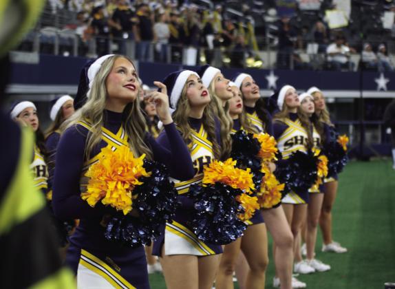 Stephenville cheerleaders look up at the large screen in AT&amp;amp;T Stadium while a play is under review. Below, Stephenville fans cheer loudly after the review is called in Stephenville's favor. For more photos, see The Dublin Citizen Facebook page. Wyndi Veigel-Gaudette | Citizen staff photos