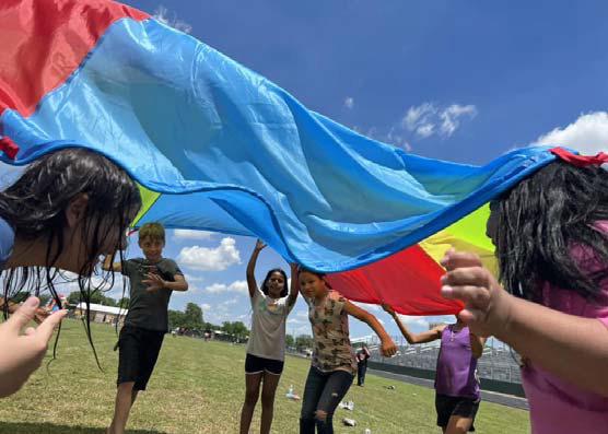 Submitted photo Intermediate School students, above and below, enjoy field day on Thursday, May 18.