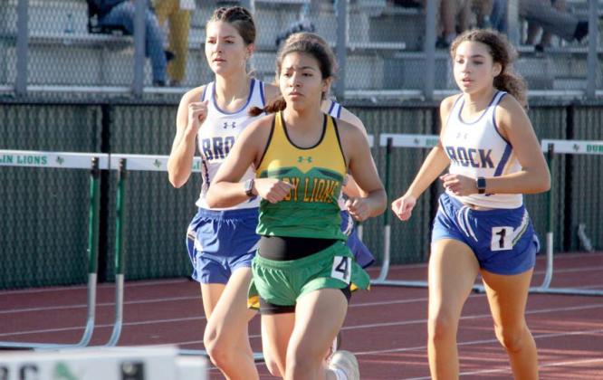 Yesenia Osoria (above, center) claimed third in the varsity girls 3200m run at the district track meet in Dublin last week with a time of 13:37. Cameron Patton (below, right) placed fourth in the 400m Dash with a time of 51.73. Wyndi Veigel | Citizen staff photo
