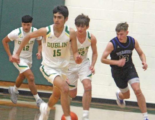 Dublin Lions circle to race down the court in the Jan. 21 home game. Paul Gaudette | Citizen staff photo
