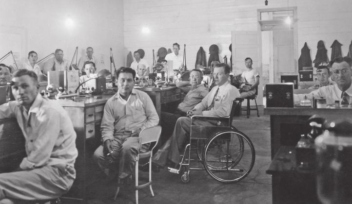The Swindle’s School taught men who were crippled by Polio or in military service to earn a living doing watch repair. Grady Swindle’s kind words taught the men they could still lead a good life even with a disability. Mr. Swindle is in the center of the photo in the wheel chair. Tom Rogers | Ralph and Dossie Rogers Collection Tarleton University