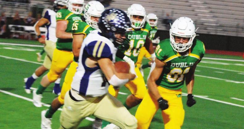 A San Saba ball runner is cornered Friday night by Lions Michael Stanley, Javier Parra, Mosiah Lolohea and Cooper Hubble during the 2021 Lions Homecoming game. Paul Gaudette | Citizen staff photo