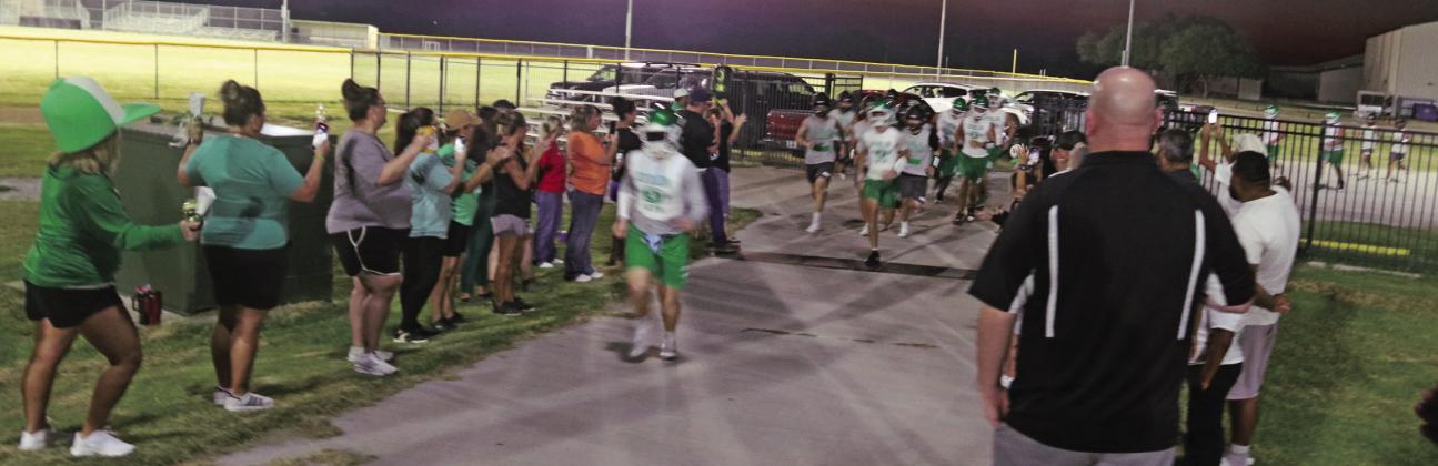 Dublin Lions were welcomed to the first day of practice Monday, Aug. 3 by parents, community members and cheerleaders as they took to Cervetto Field with coaching staff. Paul Gaudette | Citizen staff photos