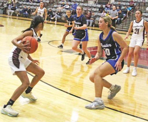 Lingleville Lady Cardinals try to get the ball past Peaster defense in the Dec. 3 home game. Paul Gaudette | Citizen staff photo
