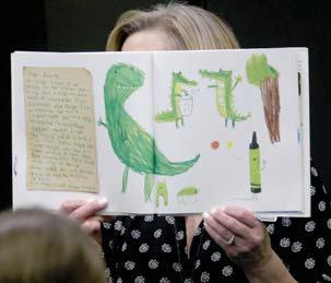 Christine Newton with Cross Timbers Fine Arts Council reads ‘The Day the Crayons Quit’ at an event for the library.