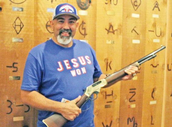 Paul Gaudette | Citizen staff photo Jose Torralba was the lucky winner of the Henry Lever Action 45-70 Rifle raffled during the 2023 Dublin Rodeo Heritage Museum awards banquet held Nov. 11 at Dublin Intermediate School. The special engraved rifle is designated as the “Rodeo Heritage Museum Collector Series 5.”