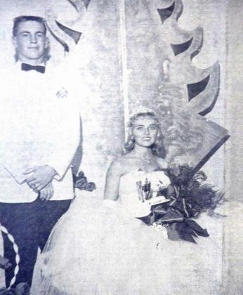 Miss Jackie Jordan, daughter of Dr. and Mrs. Carl A. Jordan was crowned the first queen of the Dublin Free Fall Fair in 1959. Her escort was Charles Eoff. It took place in the Community Building at the Fair grounds. | Dublin Historical Museum archive photo