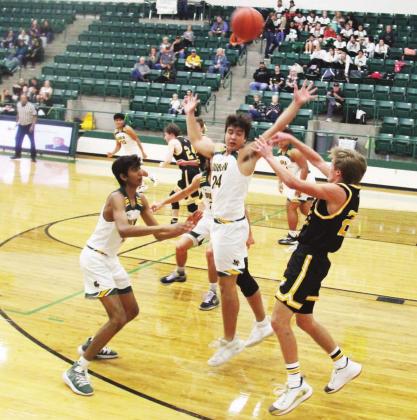 Dublin Lions Chris Teten blocks a pass while teammate Ayush Patel moves in to assist during their opening game against Goldthwaite in last week’s Dublin Athletic Booster Club Tournament. The varsity boys got consolation, only losing to Tolar and Brownwood. Paul Gaudette | Citizen staff photo