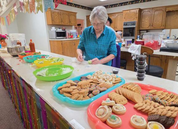 Celinda Jurney, a member of First Baptist Church of Dublin, organizes toppings and cookies for the Cinco De Mayo themed Taco Fundraiser Friday, May 2. The dinner and silent auction raised more than $7,000 to aid in replacing the AC unit for the preschool. Wyndi Veigel-Gaudette | Citizen staff photo