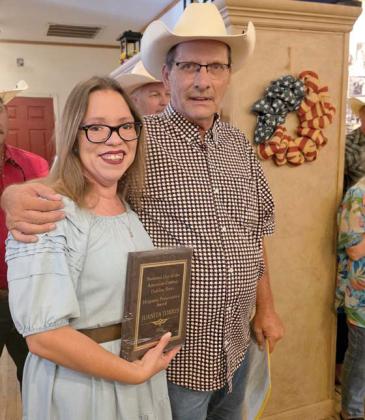 Municipal Judge Juanita Torres is presented with the Hispanic Preservation Award by museum organizer Rick Taylor for her work each year with Dublin’s Hispanic Heritage Festival. Wyndi Veigel-Gaudette | Citizen staff photo