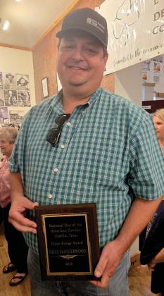 Cole Leatherwood is presented with the Open Range award for his community involvement by the Dublin Rodeo Heritage Museum. Wyndi Veigel-Gaudette | Citizen staff photo
