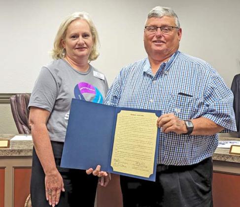 Laura Gambino, Executive Director of Cross Timbers Family Services, is presented a proclamation by Dublin Mayor David Leatherwood for in honor of National Crime Victim’s Rights Week April 21-27.