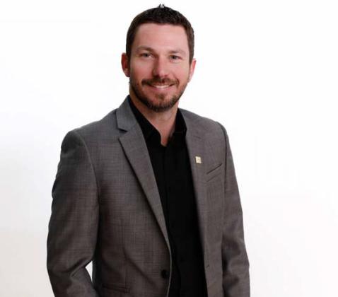Shawn Stone, a 2005 Dublin High School graduate, has found his perfect job as a real estate agent. Courtesy photo