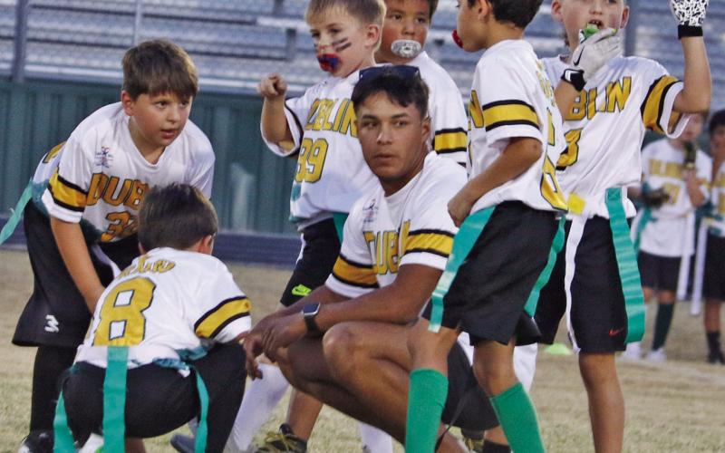 Tim Teten (above) crouches to coach kids in last fall’s Dublin Youth Football League and was assisted by his brother, Alex Teten (below), is a senior active in football, basketball and baseball. Paul Gaudette | Citizen staff photo