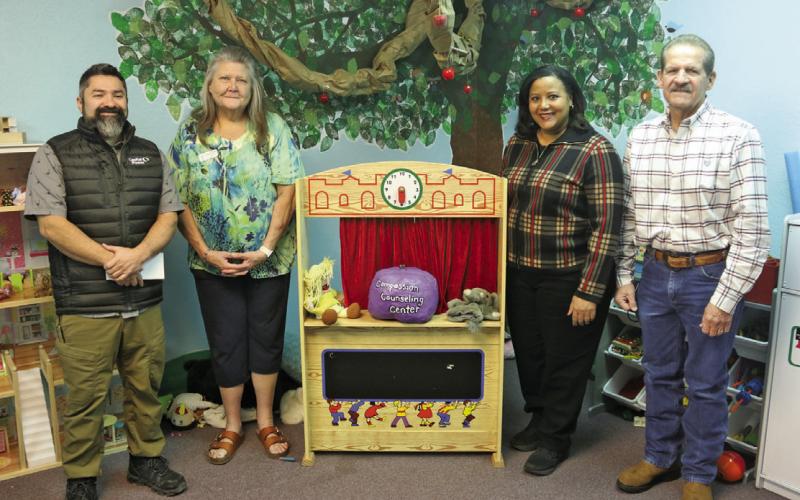 A $5,000 donation from Capital Power will aid Compassion Counseling Center this year. From left is Capital Power’s Manuel Flores, Elizabeth Foster, JJ Conway, and Carl Adams. Paul Gaudette | Citizen staff photo