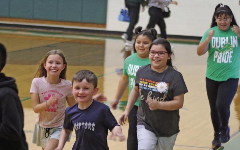 Dublin youngsters were rewarded for good attendance by getting to run on the court with the Dublin Lions Friday, Feb. 6. Paul Gaudette | Citizen staff photo