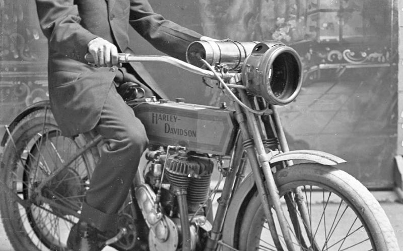 This appears to be a Harley-Davidson 1912 Model 8A. The photo is from the Ralph Rogers collection. The photo was taken at the Edmond Photo Studio on Patrick Street. The gentleman is unknown. | Dublin Historical Museum Archive photo