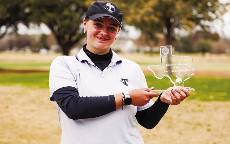 Tarleton State University golfer Louise Depadt poses with her Invidividual Champion trophy from the Texas State Invitational. | Submitted photo