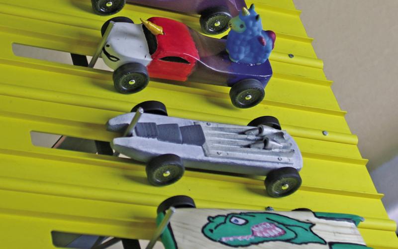 Championship cars line up for their final race at the annual Pinewood Derby hosted by Cub Scout Pack 35. Paul Gaudette | Citizen staff photo